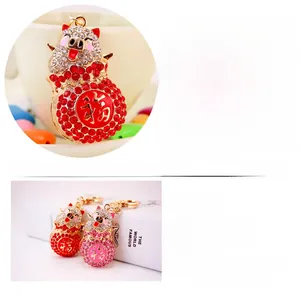 Macro detail of pig keychain showing dimensions and premium rhinestone craftsmanship