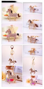 Detail view of crystal-encrusted horse keychain pendant with colorful enamel accents