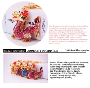 Detail of dragon keychain with colorful crystals and polished zinc alloy finish