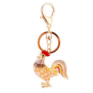Porte-clés coq créatif avec pierres d'opale et strass scintillants sur métal doré brillant