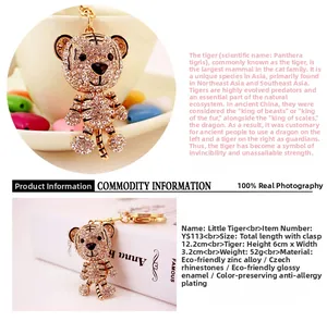 Detail view of rhinestone tiger keychain with dimensions 12.2cm and zinc alloy material
