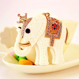 Cute resin white elephant keychain with gold crown and sparkling colorful rhinestones