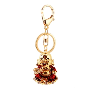 Golden Maitreya Buddha keychain with red enamel and sparkling rhinestones for car keys