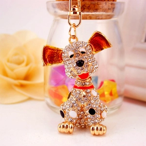 Sparkly spotted puppy dog keychain with crystal rhinestones and red enamel ears