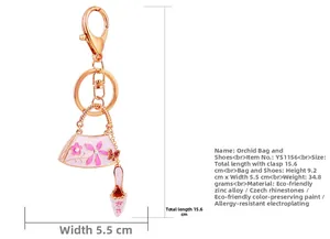 Detailed view of pink orchid handbag and shoe keychain charm with dimensions in rose gold