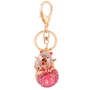 Sparkling pink rhinestone pig keychain with golden fu character and alloy clasp for women