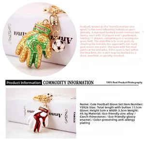 Detail view of soccer goalie glove keychain with rhinestones and mini football charm