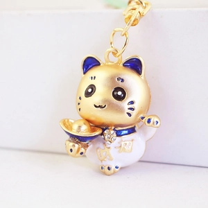 Porte-clés chat de la fortune doré et blanc avec strass pour sac ou accessoire voiture