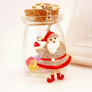 Exquisite rhinestone-studded Santa Claus keychain with gold finish and red enamel details