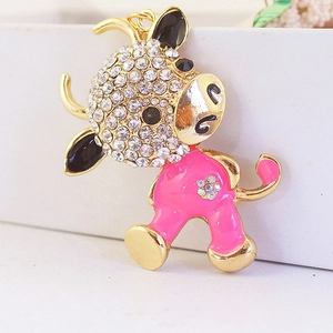 Cute cartoon cow keychain pendant with gold plating, pink enamel, and sparkling rhinestones