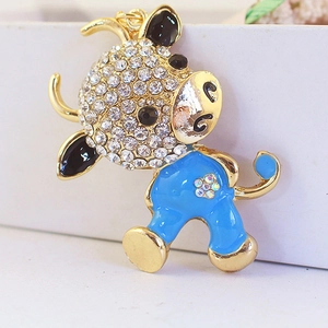 Cartoon ox keychain pendant with blue enamel and sparkling rhinestones on gold metal base