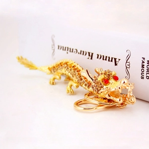 Exquisiter goldener Schlüsselanhänger chinesischer Drache mit gelben Bernstein-Steinen