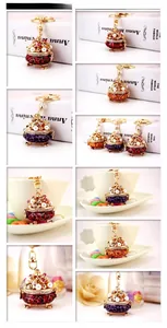 Detailed macro view of vintage Chinese style crystal incense burner metal keychains