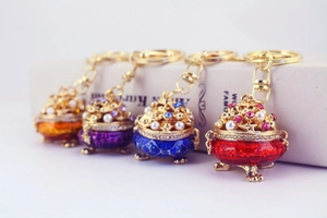 Set of four colorful enamel incense burner keychains with crystals and faux pearls