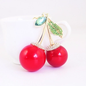 Sparkling crystal cherry keychain with vibrant red spheres and green gemstone leaves
