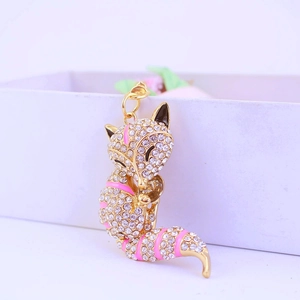Sparkling crystal fox keychain with pink enamel and gold-plated alloy for handbags