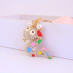 Golden snake keychain with colorful rhinestones and pearls for women car handbag charms
