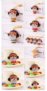 Detail view of monkey keychain set with colorful rhinestones in multiple color options