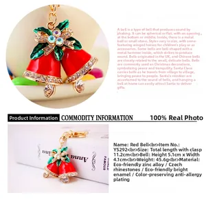 Macro detail of red bell Christmas keychain with rhinestones and size measurements
