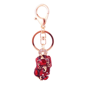 Red rhinestone Pixiu keychain charm in rose gold finish with traditional Chinese style