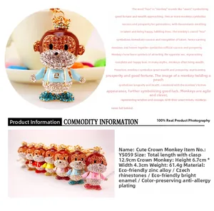Detail of crystal crown monkey keychain showing sparkling rhinestones and size dimensions