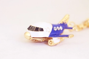 Detail of A380 airplane keychain with blue enamel and sparkling crystal rhinestones