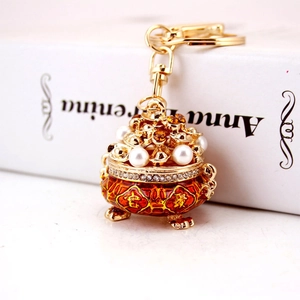 Golden incense burner keychain with lucky Chinese character and sparkling rhinestones