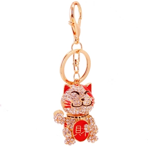 Golden fortune cat keychain with sparkling crystals and red 'Fortune' character
