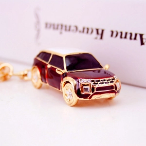 Creative SUV car keychain with burgundy enamel, crystal accents and golden metal finish