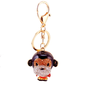 Cartoon monkey keychain featuring sparkling rhinestones and gold-plated clasp accessory