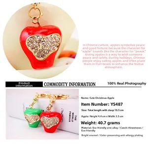 Detail showing red and green apple keychains with Czech rhinestones and 10.5cm length