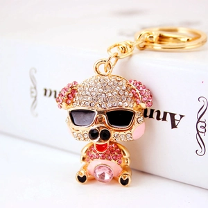 Sparkling rhinestone pig keychain with sunglasses and pink main crystal on gold base