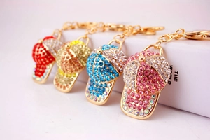 Sparkling rhinestone baseball cap keychains in four colors with golden rotating hooks