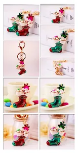 Detailed views of red and green Christmas boot keychains with pearls and rhinestones