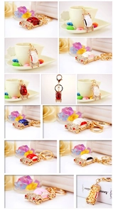 Close-up collage of sparkling beetle car keychains with crystals and colorful enamel finish