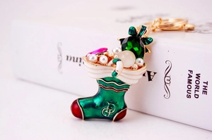 Detail of Christmas stocking keychain with colorful rhinestones and gold lobster clasp