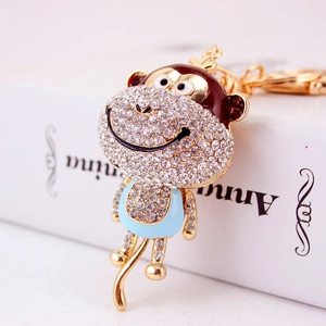 Creative rhinestone monkey keychain with gold metal plating and colorful enamel finish
