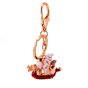 Portachiavi barca drago dorato con smalto rosso e strass come portafortuna cinese
