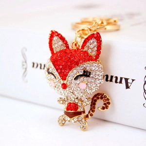 Porte-clés renard créatif serti de diamants avec cristaux rouges et anneau doré