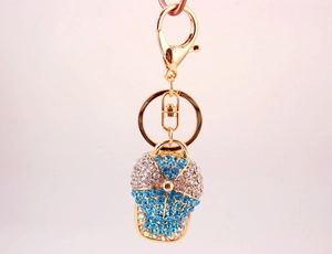 Detailed view of the lobster clasp and ring of this rhinestone baseball cap keychain