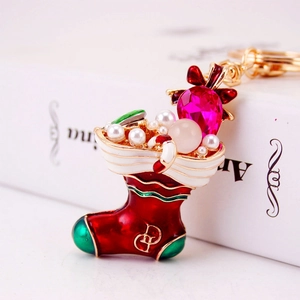 Christmas stocking keychain with red enamel, crystal rhinestones, and white pearls