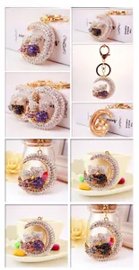 Detailed view of moon bear keychain with sparkling rhinestones in purple and black