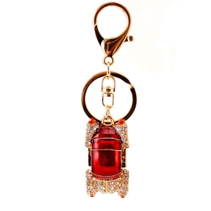 Creative red enamel car keychain with gold alloy finish and sparkling rhinestones