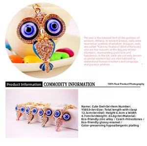 Détails des dimensions du porte-clés hibou en strass brillants avec yeux de cristal bleu