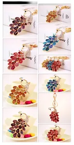 Detailed views of crystal-encrusted peacock keychains in various vibrant colors