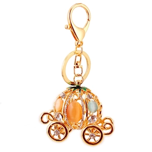 Exquisite gold pumpkin carriage keychain with colorful rhinestones and crystal beads
