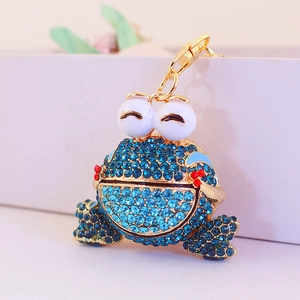 Porte-clés grenouille en strass bleus brillants avec crochet en métal doré chic