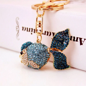 Creative gold-plated goldfish keychain with sparkling blue rhinestones and metal link