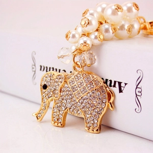 Elegant gold elephant keychain with sparkling rhinestones and white pearls for bag decor