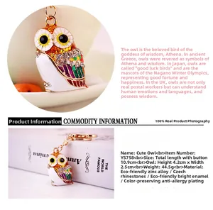 Detail view of owl keychain with dimensions 10.5cm length and colorful rhinestones